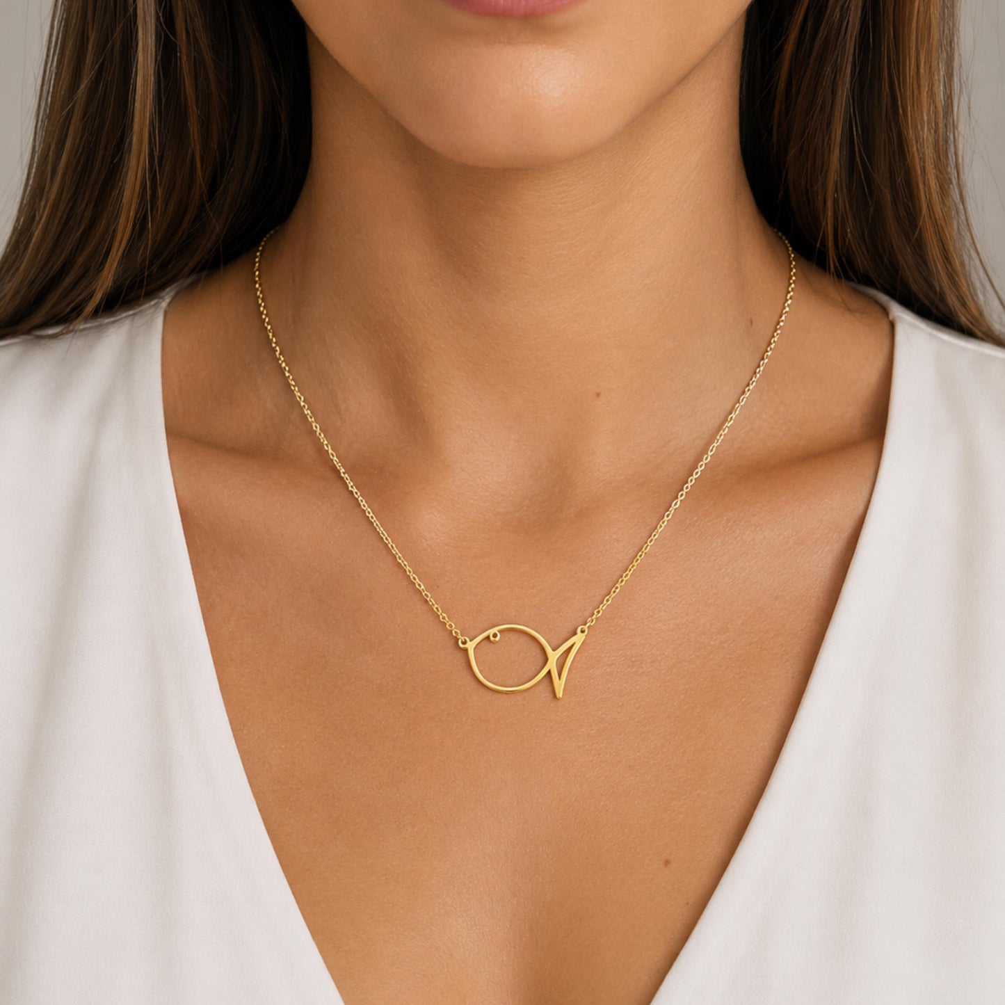 colgante pez  de plata chapada en oro