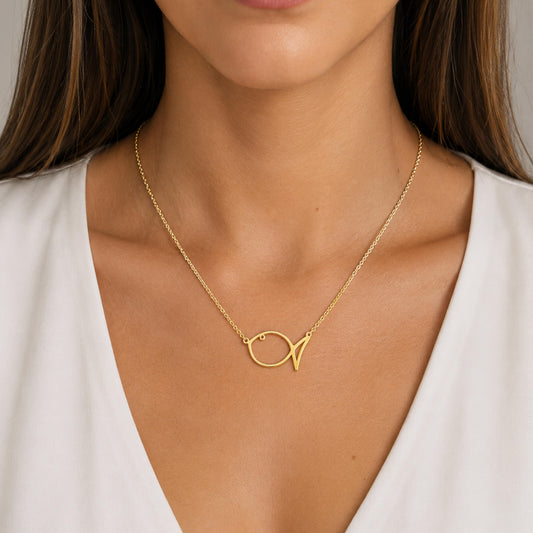 colgante pez  de plata chapada en oro